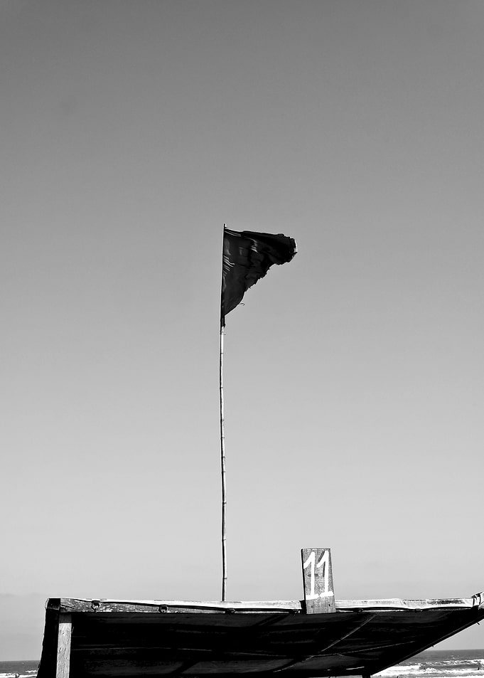 11 Black Flag on a Shelter