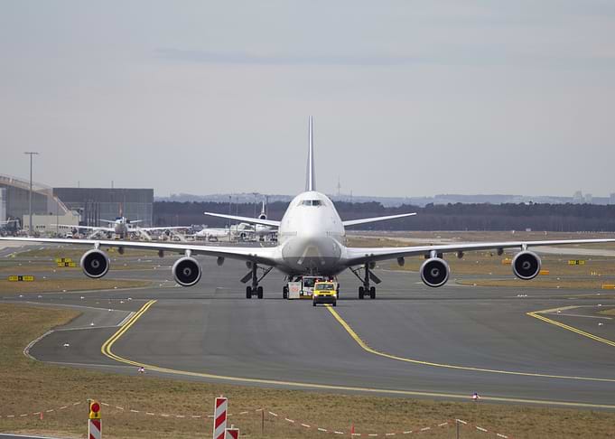 Airplane Taxiing on Runway