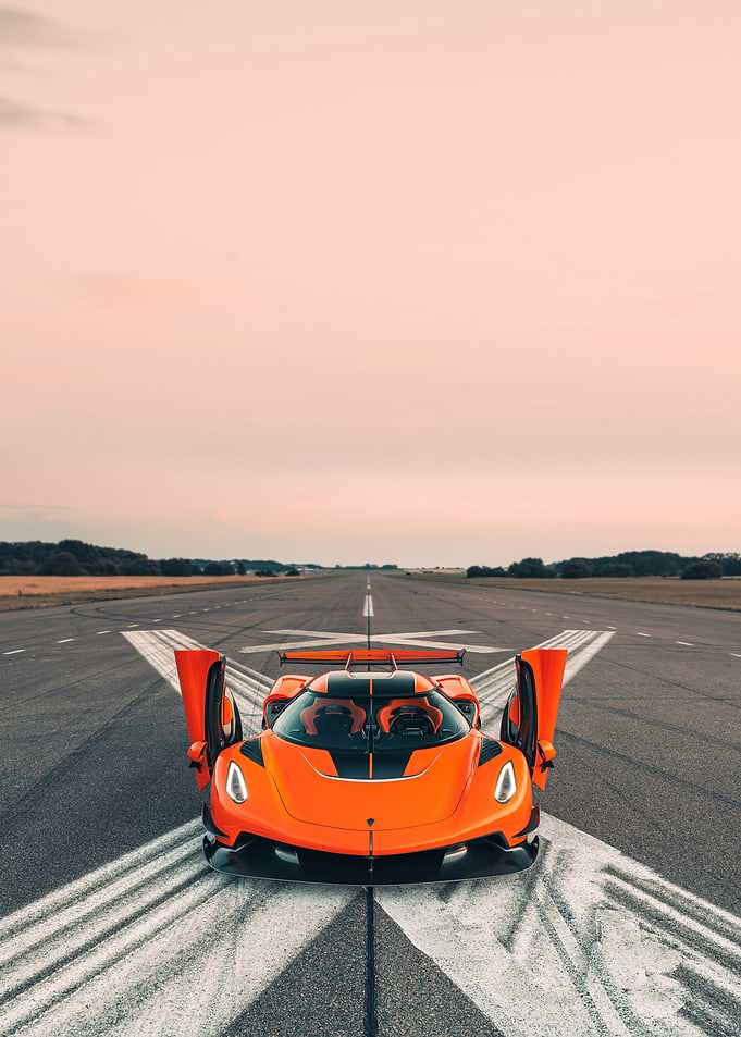 Orange Koenigsegg Jesko on a Racetrack