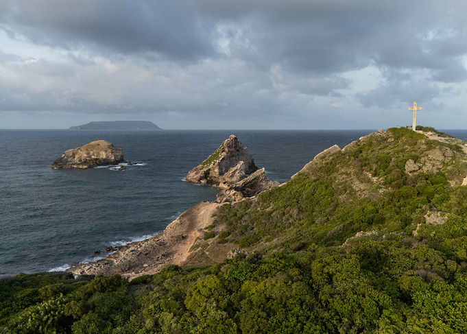 Coastal Landscape with Cross