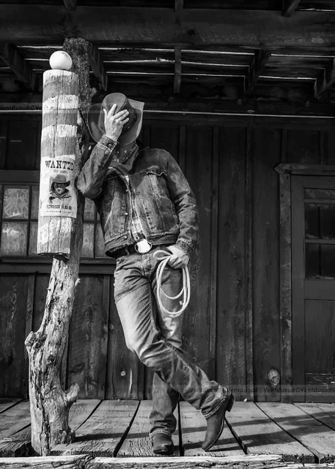 Cowboy with Wanted Poster