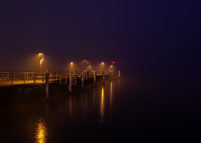 Golden Glow on a Misty Pier - Zürich