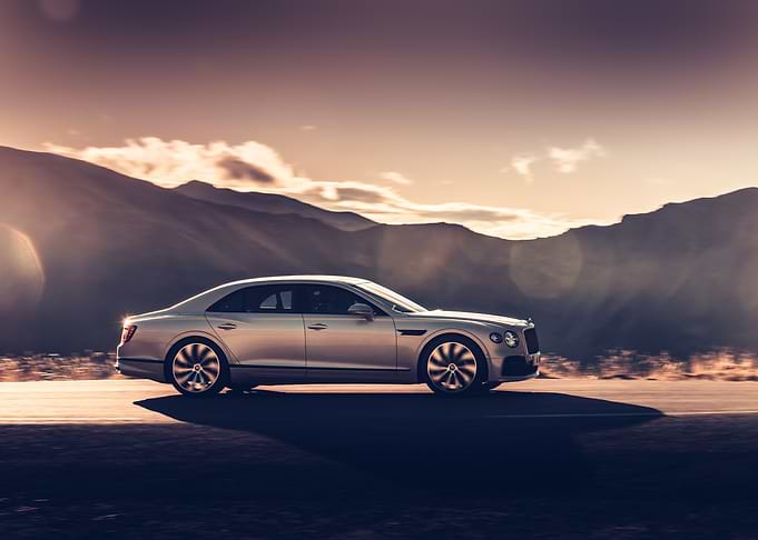 Silver Bentley on Road