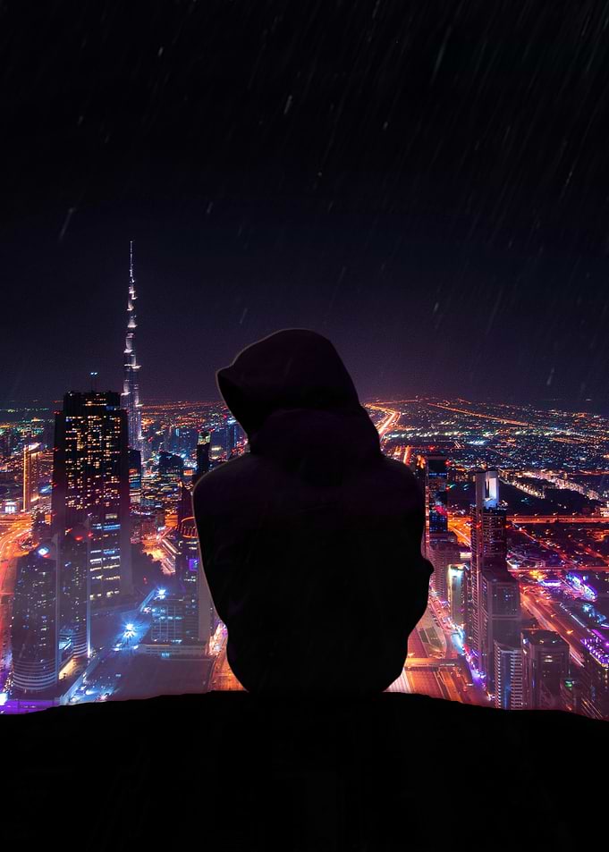 Silhouette Over Cityscape