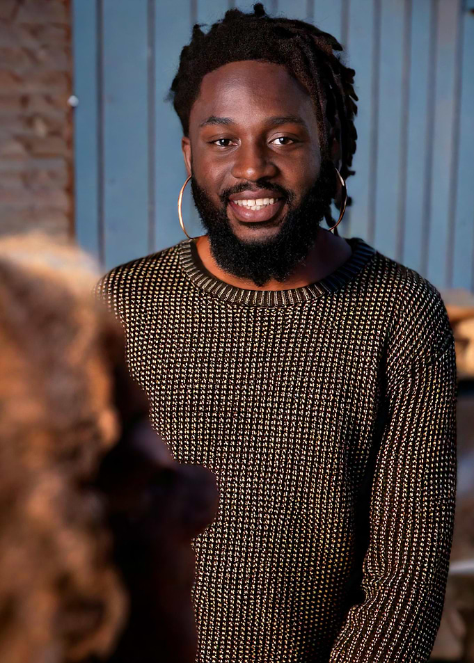 Smiling Man with Dreadlocks