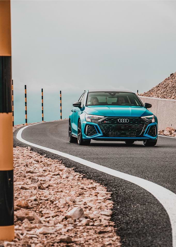 Audi RS3 on Winding Road