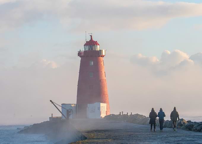 Lighthouse on a Misty Coast