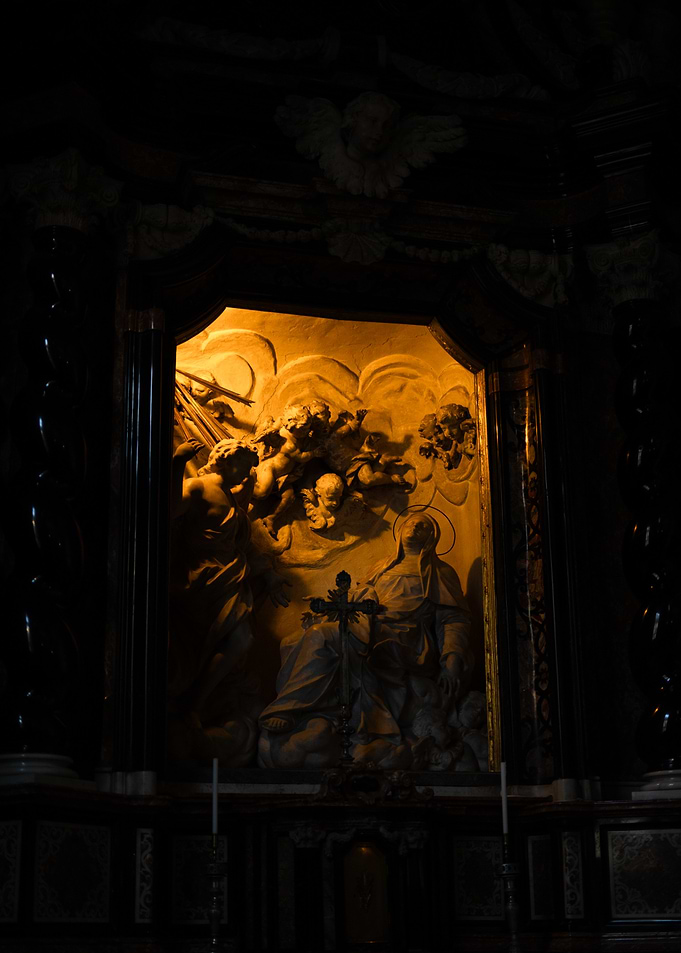 Religious Artwork in Dark Chapel
