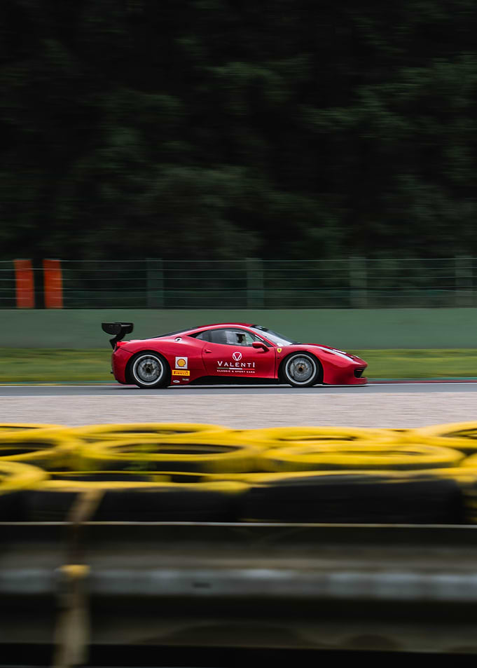 Red Ferrari on Race Track