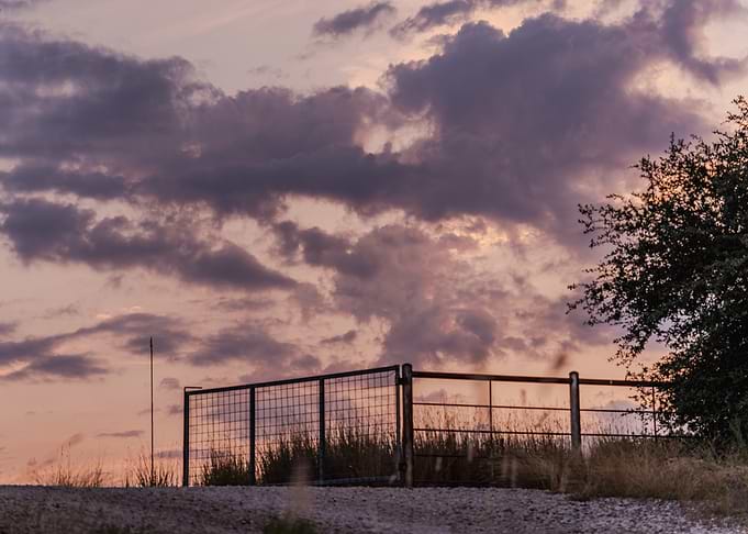 Sunset Clouds and Gate