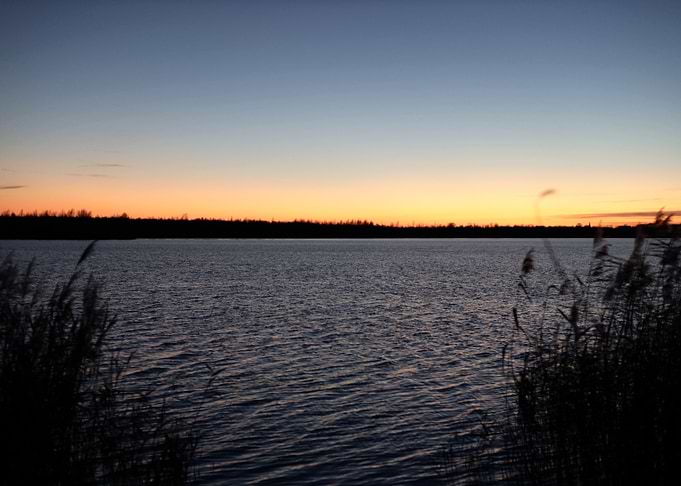 Sunset Over Still Water