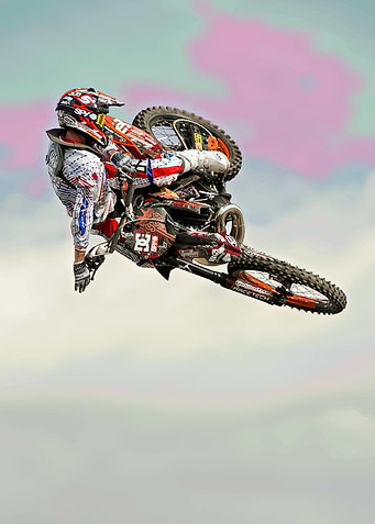 Motocross Rider in Mid-Air