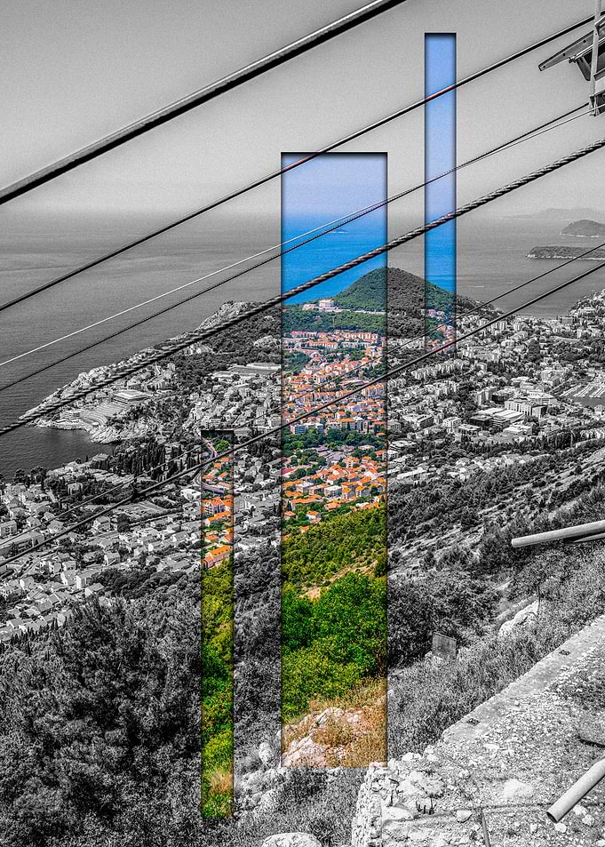 Coastal Cityscape Through Cable Car