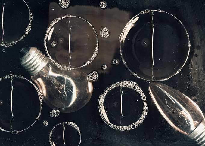 Burnout. Light bulbs in water photo.