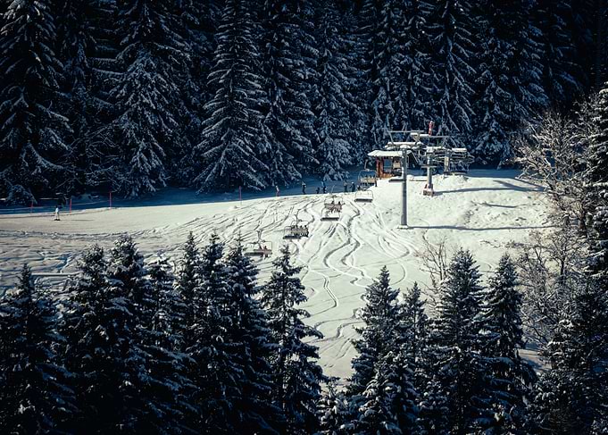 Snowy Ski Slope with Lift