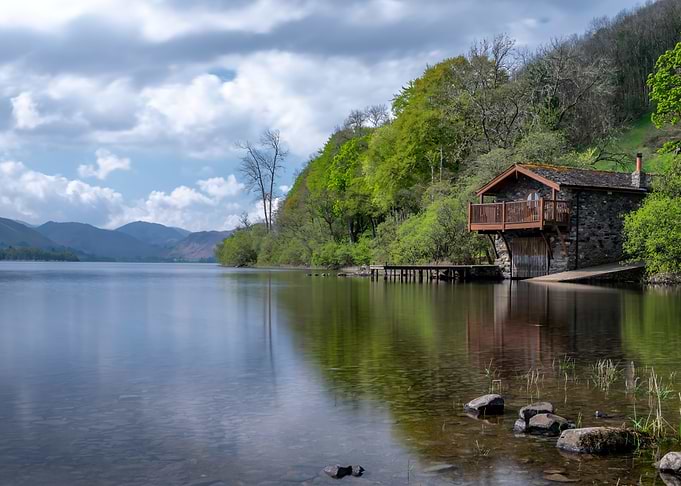 Lakefront Boat House with Mountain View