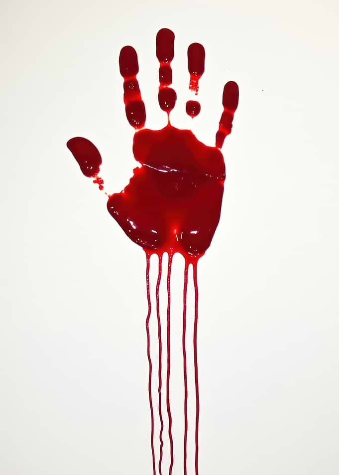 Hand print blood drip ominous