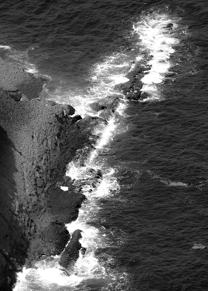 Waves Crashing on Rocks
