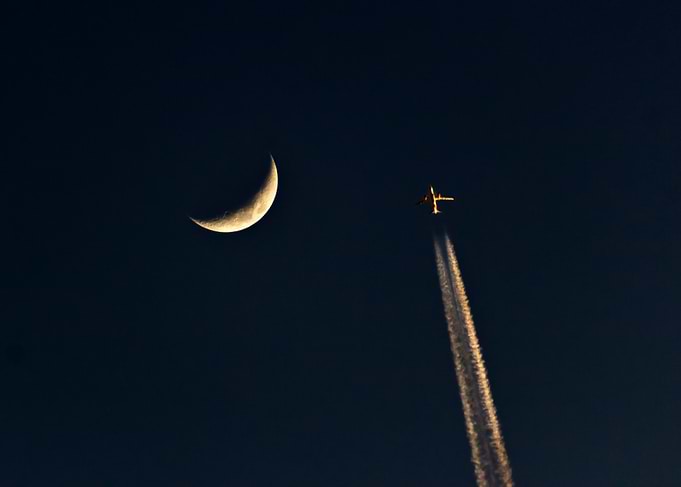 Crescent Moon and Airplane