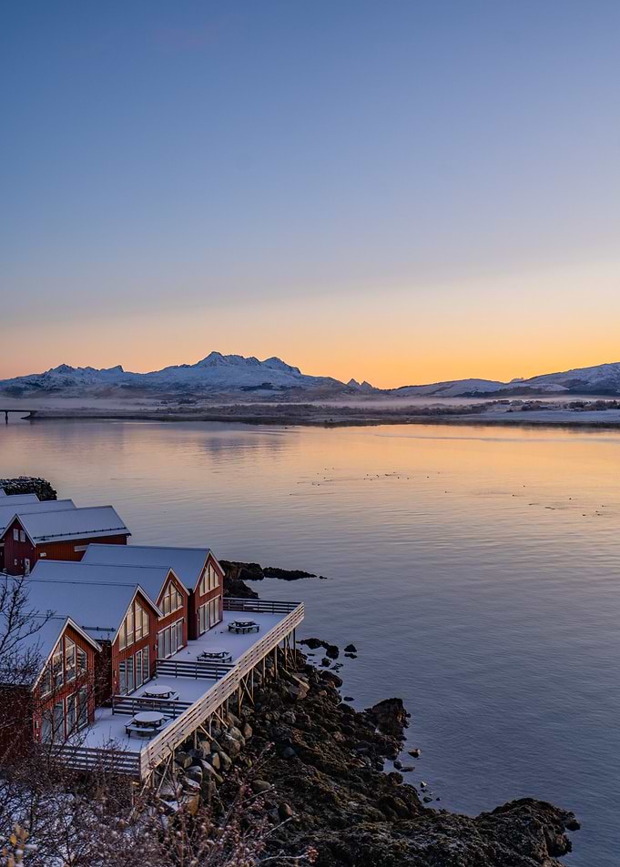 Snowy Cabins by the Fjord