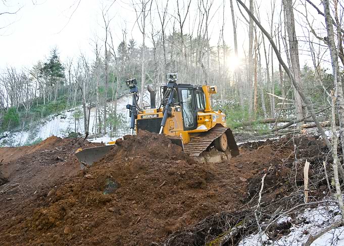 Caterpillar Bulldozer Clearing Land