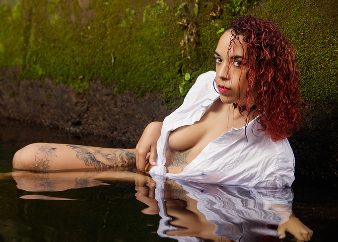 Woman in Water with Tattoos