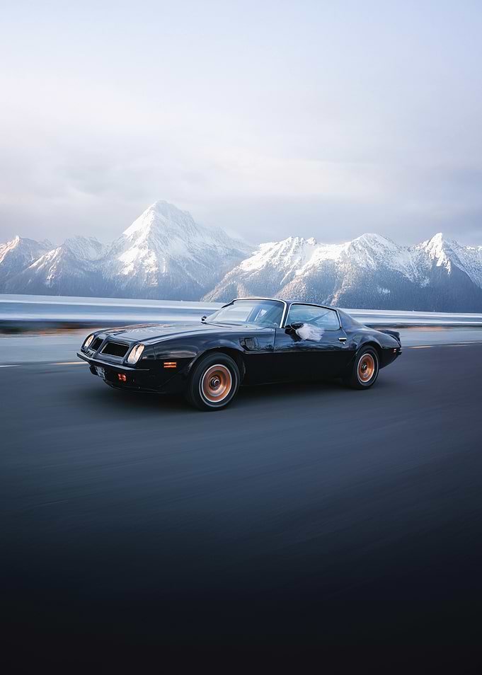 Black Trans Am in Mountains