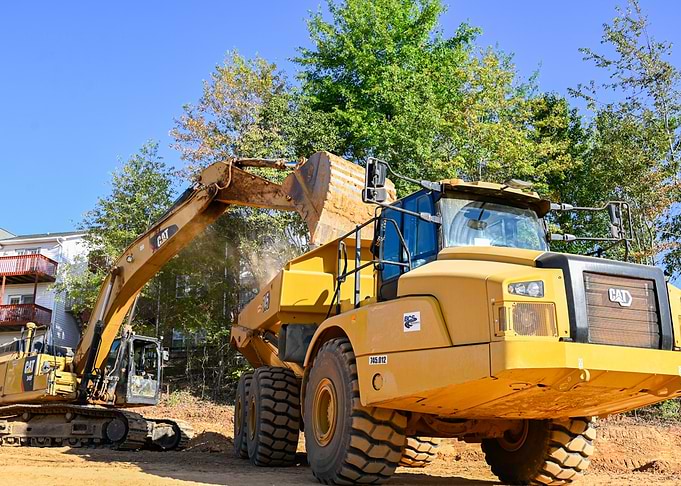 Caterpillar Excavator Loading Dump Truck