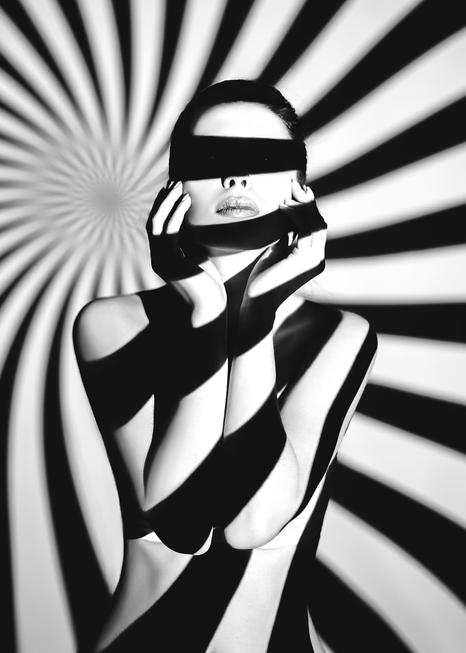 Woman in Black and White Stripes