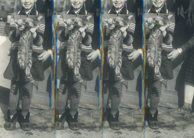 Vintage glitch photo of girl holding cat.