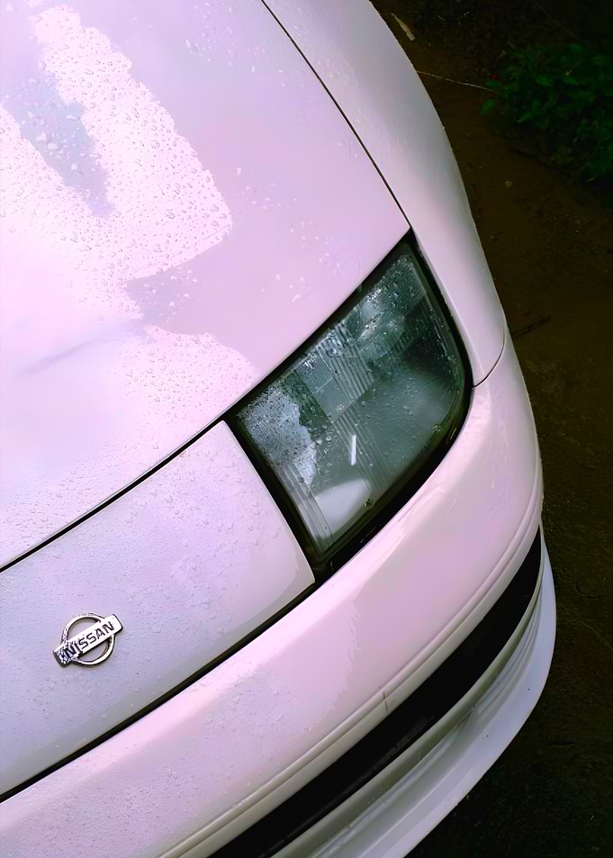 White Nissan Car Front