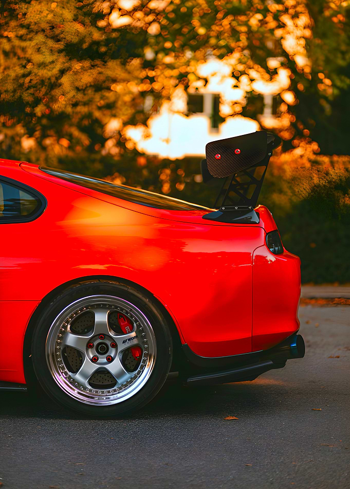 Red Toyota Supra with Spoiler