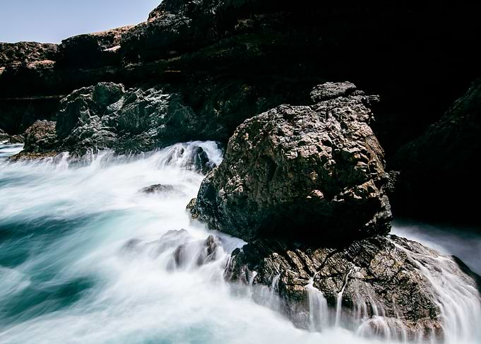 Ocean Waves Crashing on Rocks