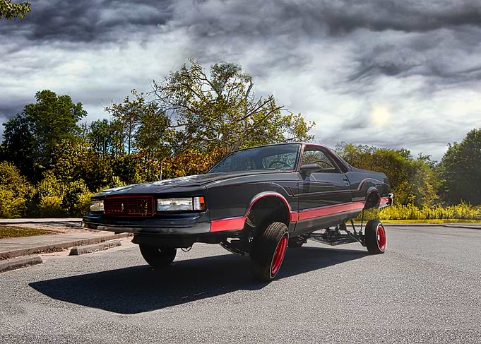 Black El Camino Lowrider with Red Stripes