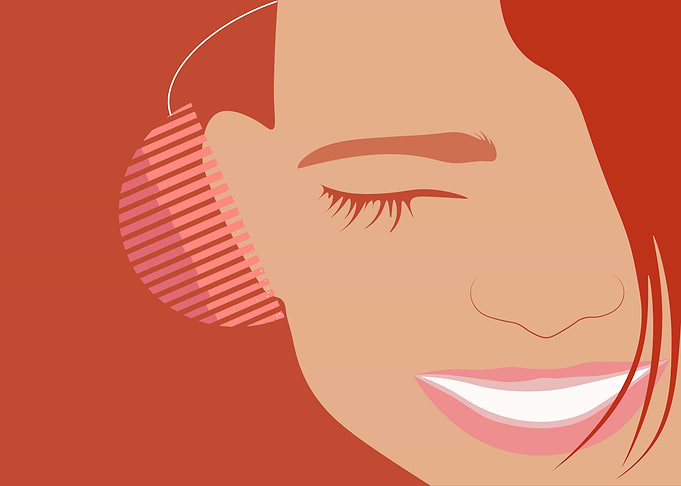 Smiling Woman with Headphones