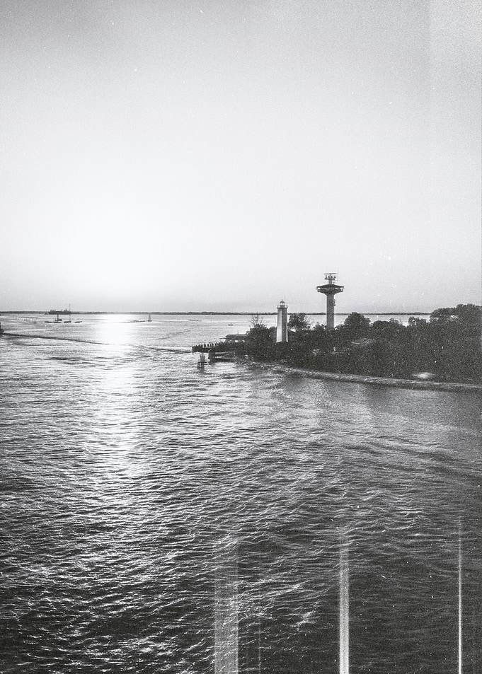Lighthouse and Tower by the Sea