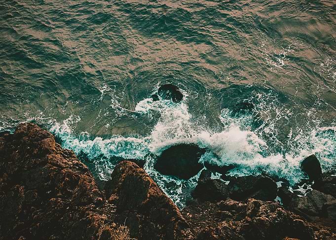 Waves Against the Rocks