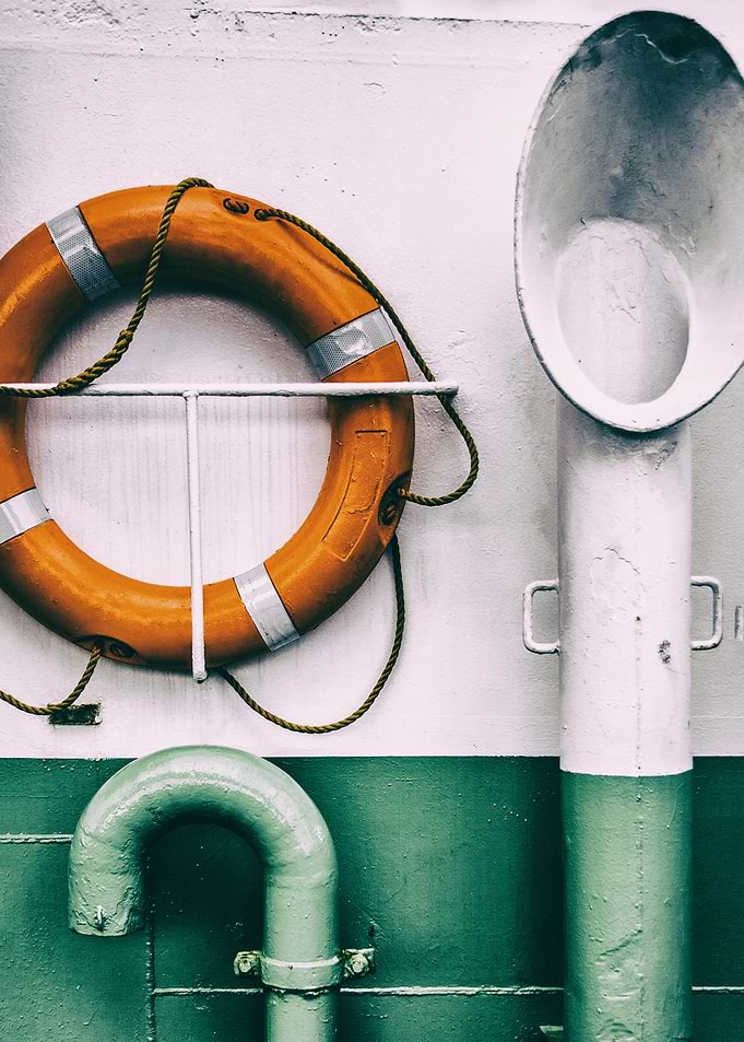 Detail of a ferry with a Lifebuoy aka Life-Preserver and Ventilation Pipes