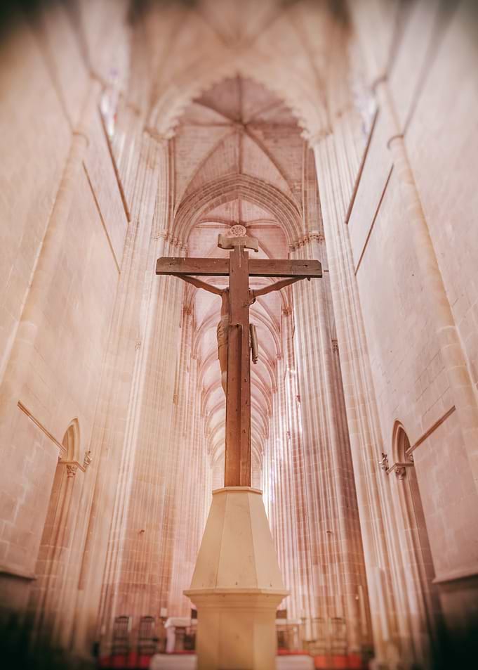 Crucifix in Gothic Cathedral. Batalha Monastery church, Portugal
