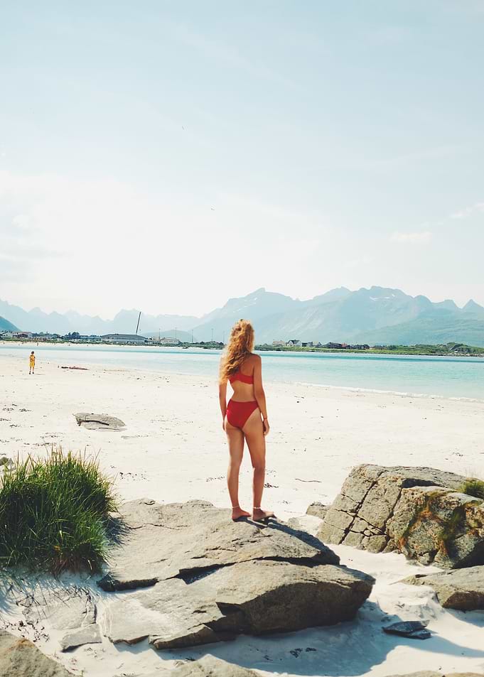 Woman in Red Bikini on Lofoten Beach