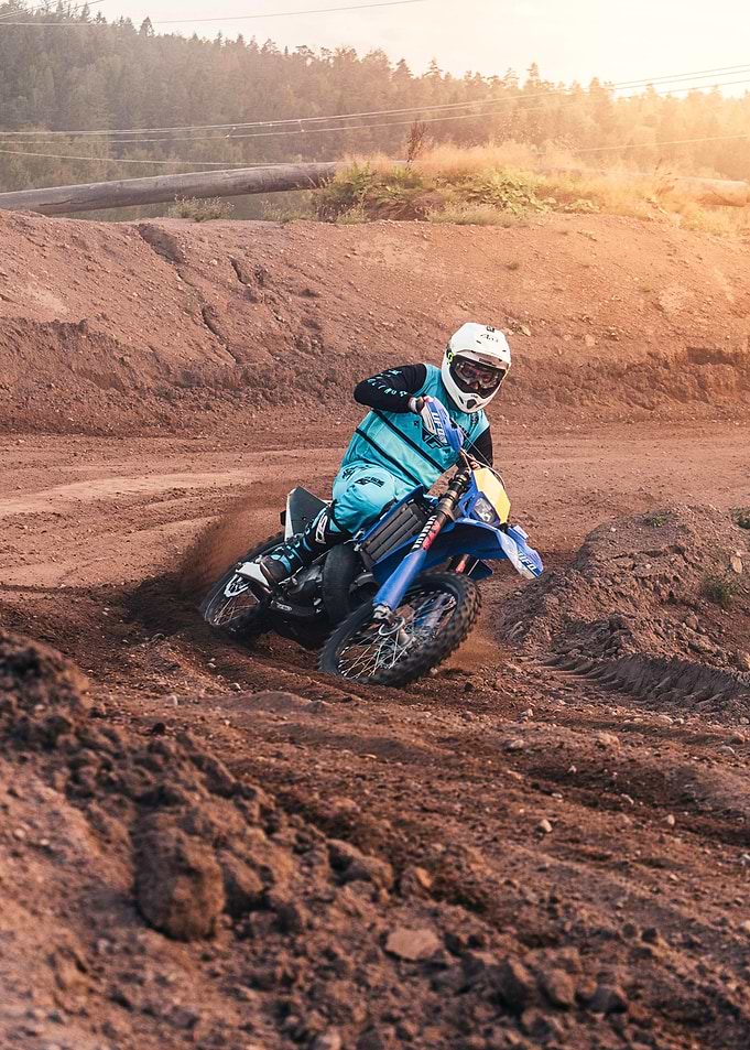 Motocross Rider on Dirt Track