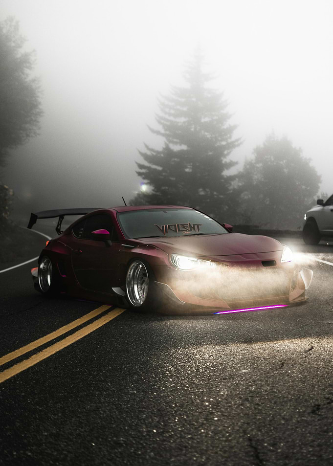 Red Sports Car in Fog