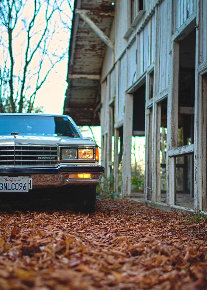 Classic Car by Old Building