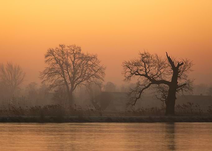 Misty River at Sunset