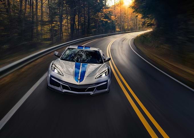 White Corvette on Winding Road