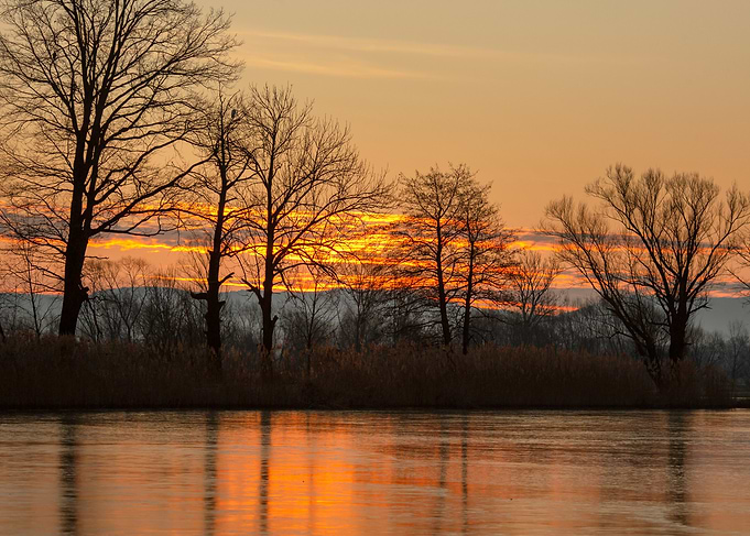 Sunset Over Frozen Lake
