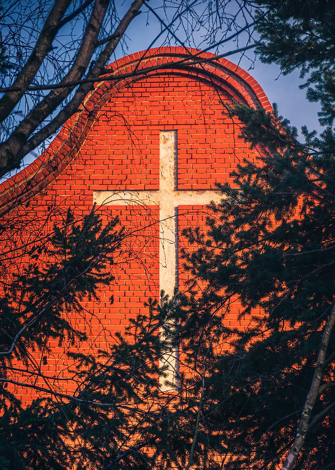 White Cross on Brick Wall
