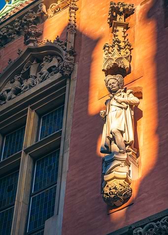 Stone Statue on Building