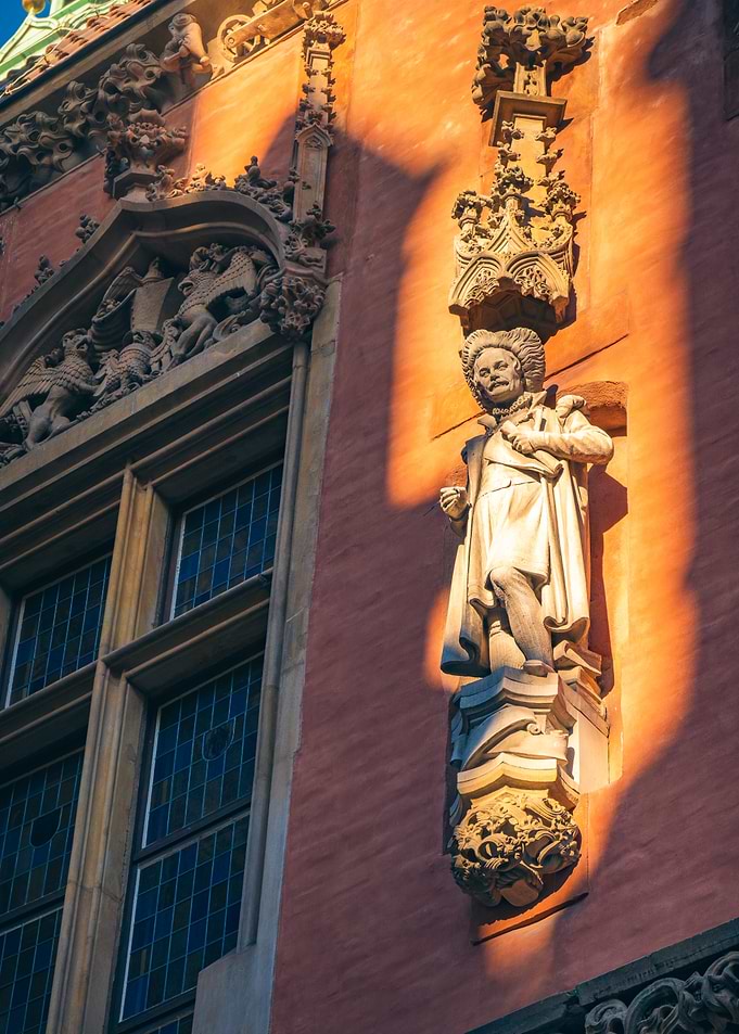 Stone Statue on Building