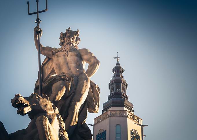 Neptune Statue in City